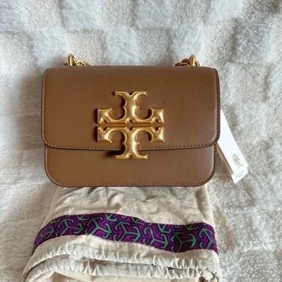 Tory Burch Handbags - Tory Burch Tan Crossbody Bag with Gold Logo